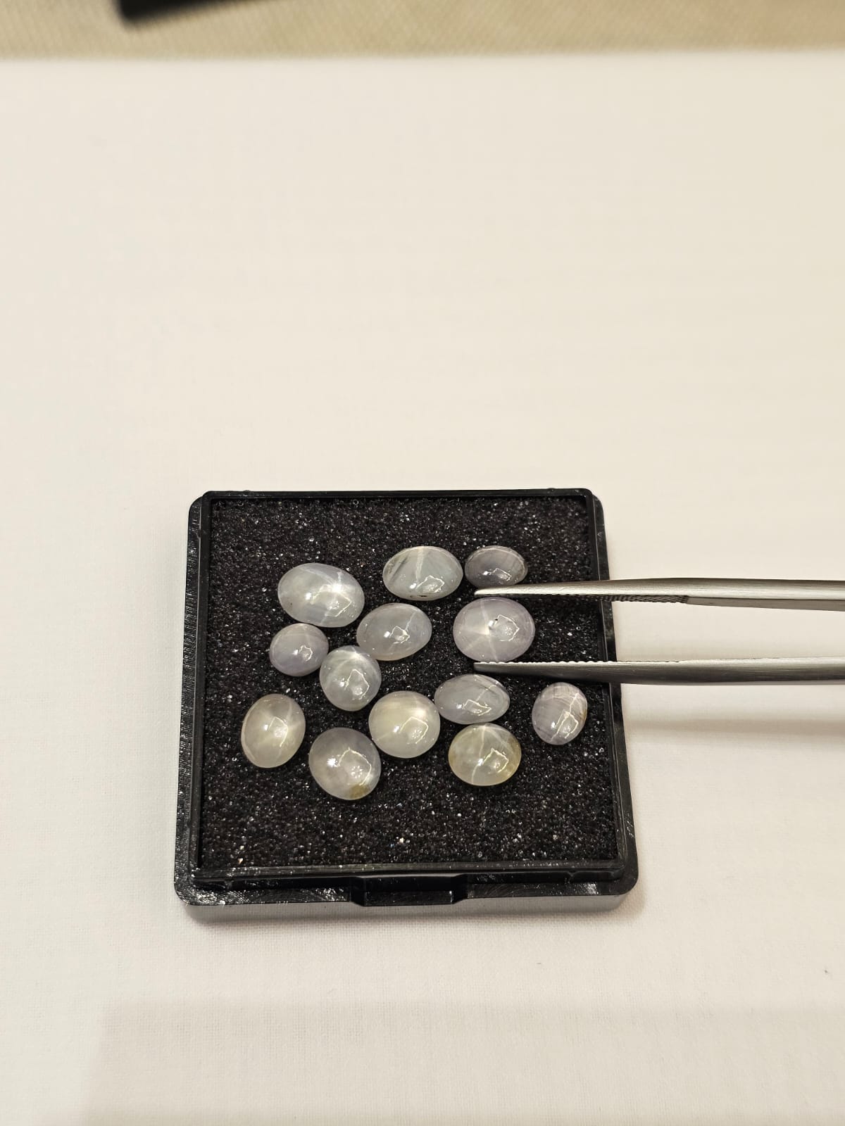 White / Light Gray Star Sapphire — Oval Cabochon Star Sapphire